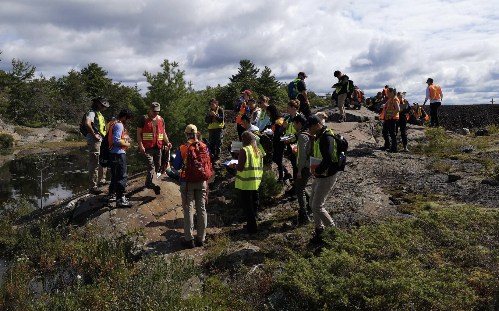 Image of geology students at Whitefish Falls conducting field mapping.