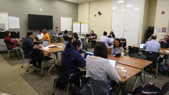 Educators working on their research projects at the Writing Retreat event—one of a number of strategic supports for Teaching Stream faculty delivered by the MacPherson Institute.