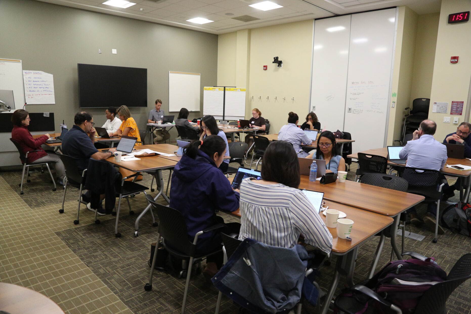 Educators working on their research projects at the Writing Retreat event—one of a number of strategic supports for Teaching Stream faculty delivered by the MacPherson Institute.